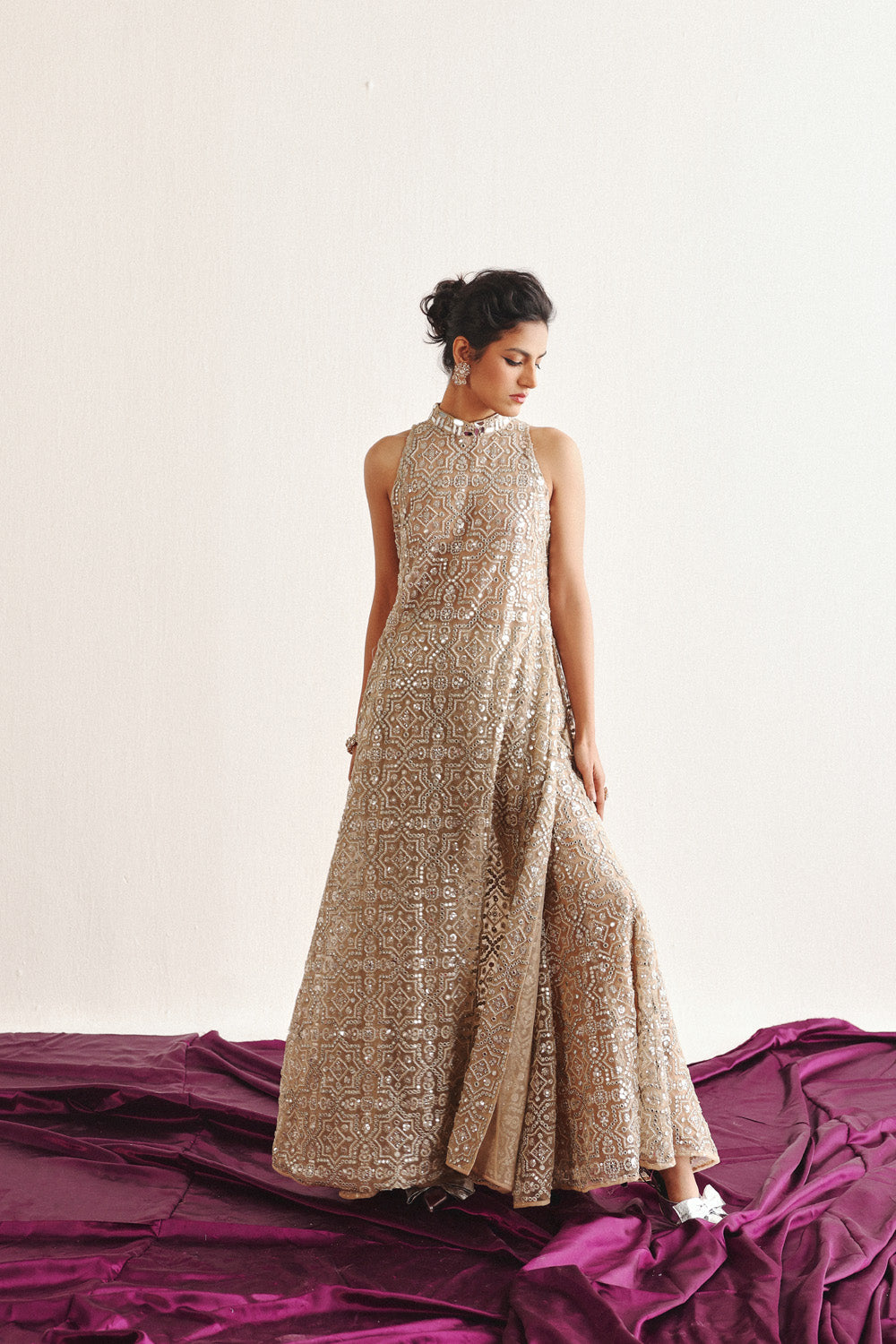 Hi Neck Long Sleeveless Dress With Slits And Flared Shararas