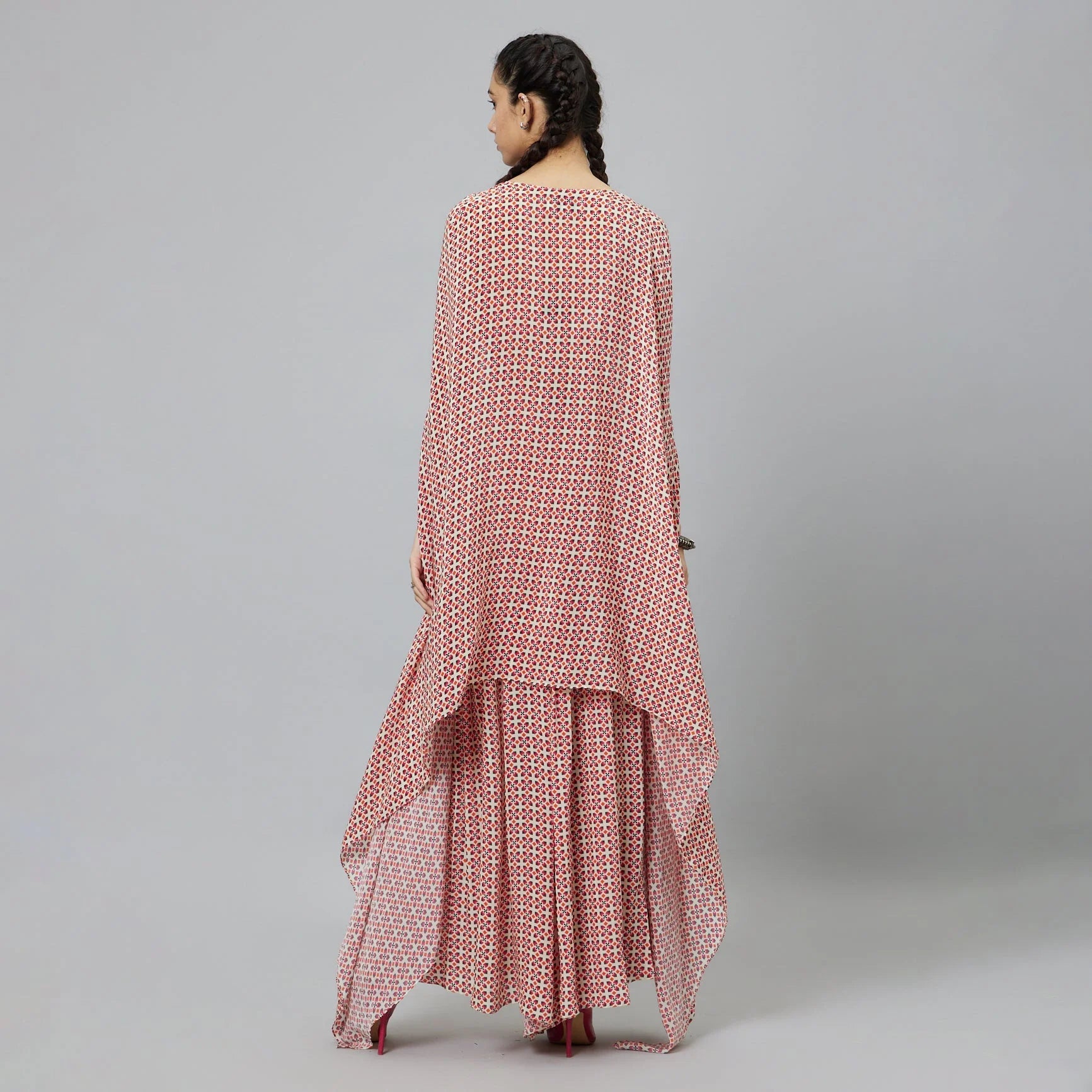 IVORY GEOMETRIC PRINT BIKINI BUSTIER WITH BOX PLEATED PANTS AND CAPE