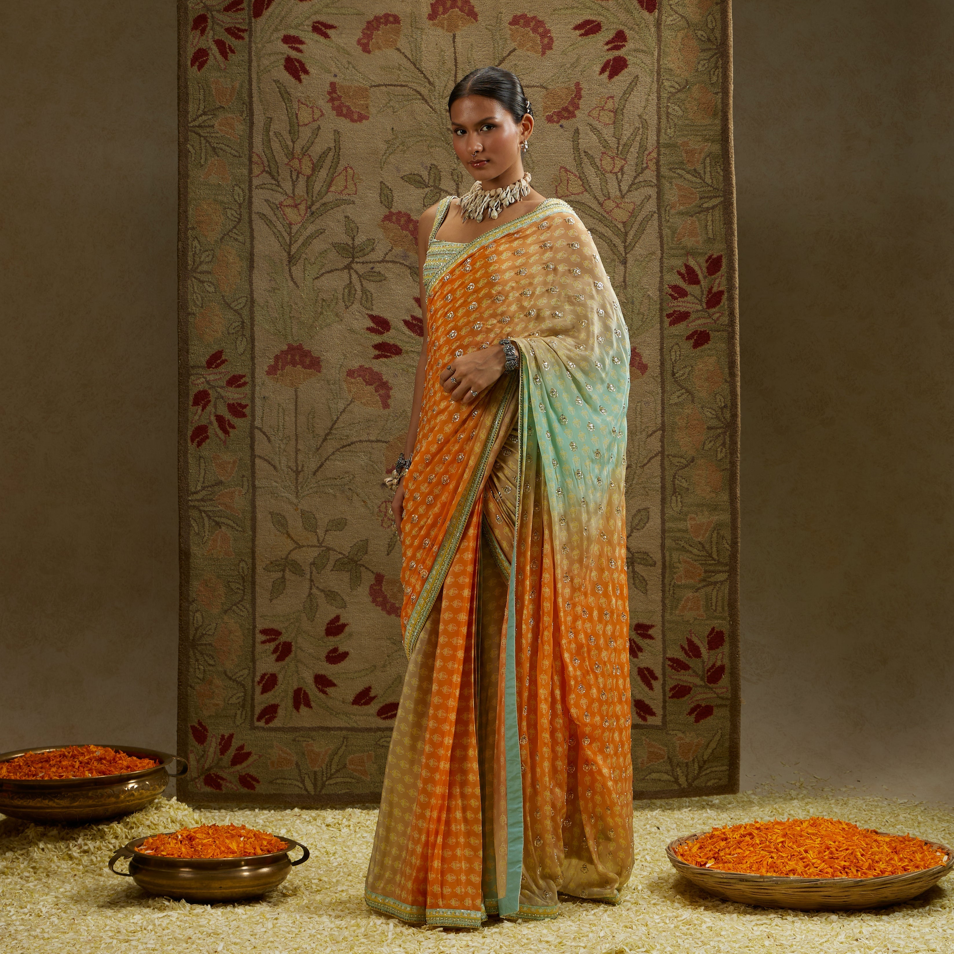 TEAL BLUE ORANGZA EMBELLISHED SAREE PAIRED WITH EMBELLISHED BLOUSE