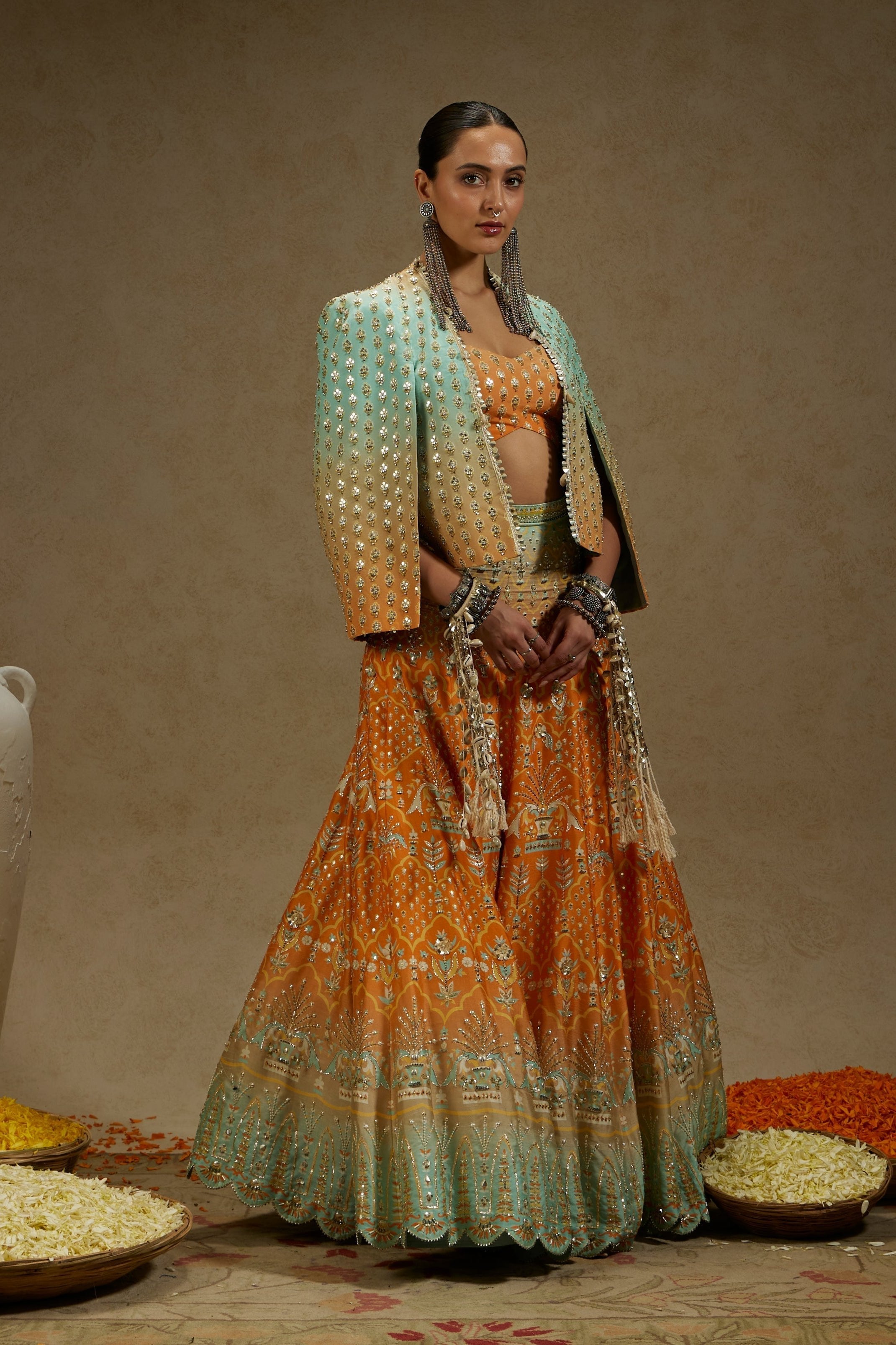 ORANGE BLUE EMBELLISHED NOOR JACKET PAIRED WITH EMBELLISHED BUSTIER AND OMBRE EMBELLISHED LEHENGA