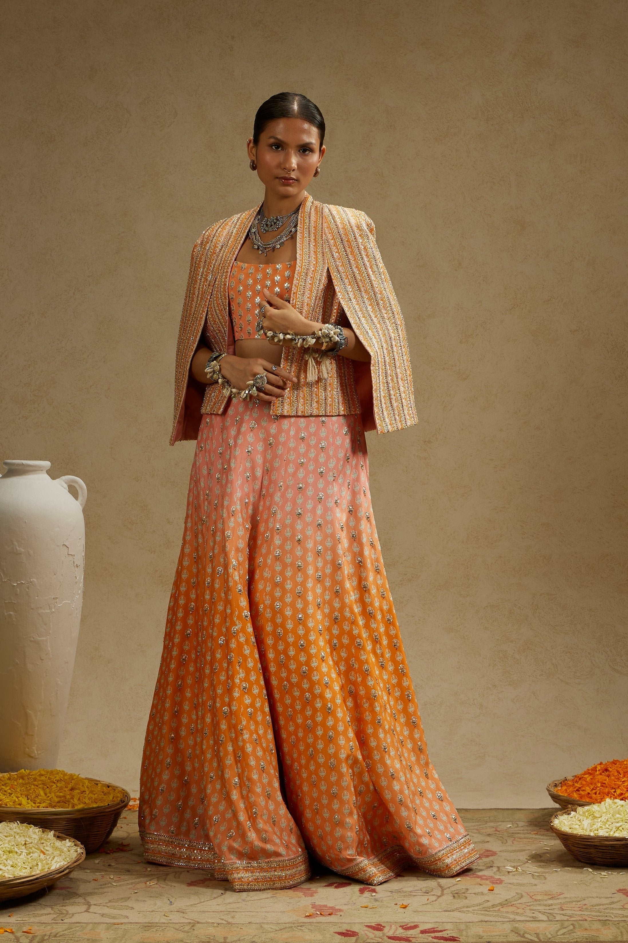 Border Embellished Noor Jacket Paired With Embellished Bustier And Ombre Embellished Lehenga