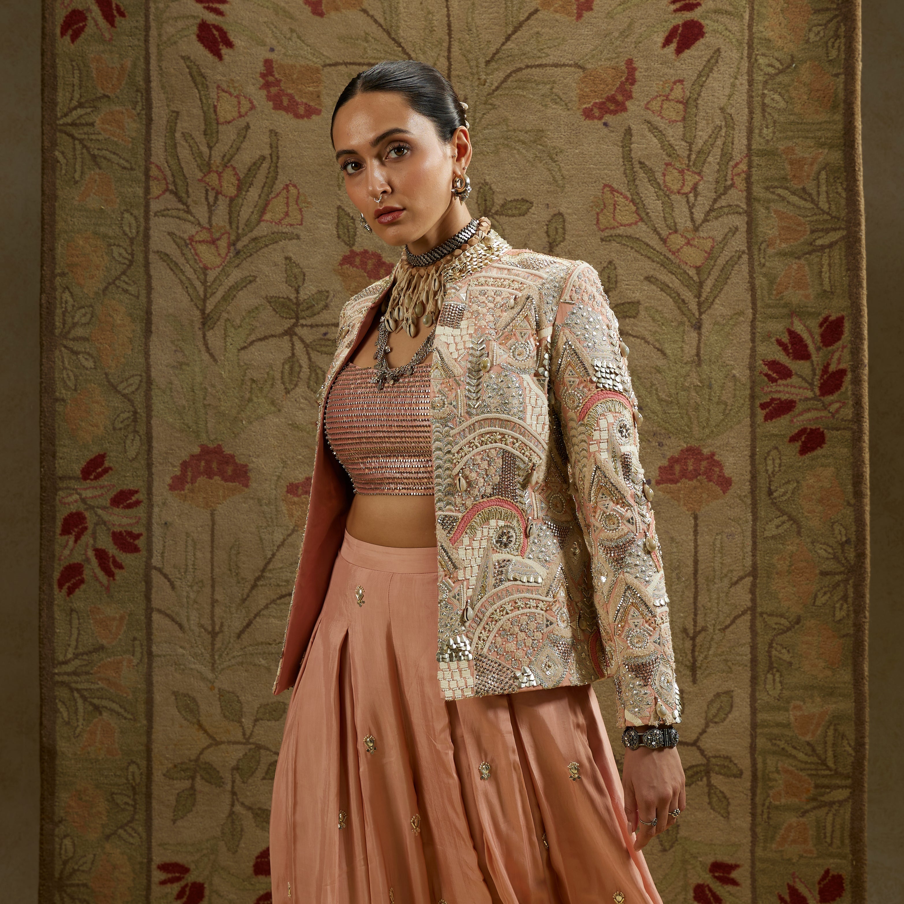 PINK EMBELLSIHED JACKET PAIRED WITH BUSTIER AND EMBELLISHED PLEATED PANTS