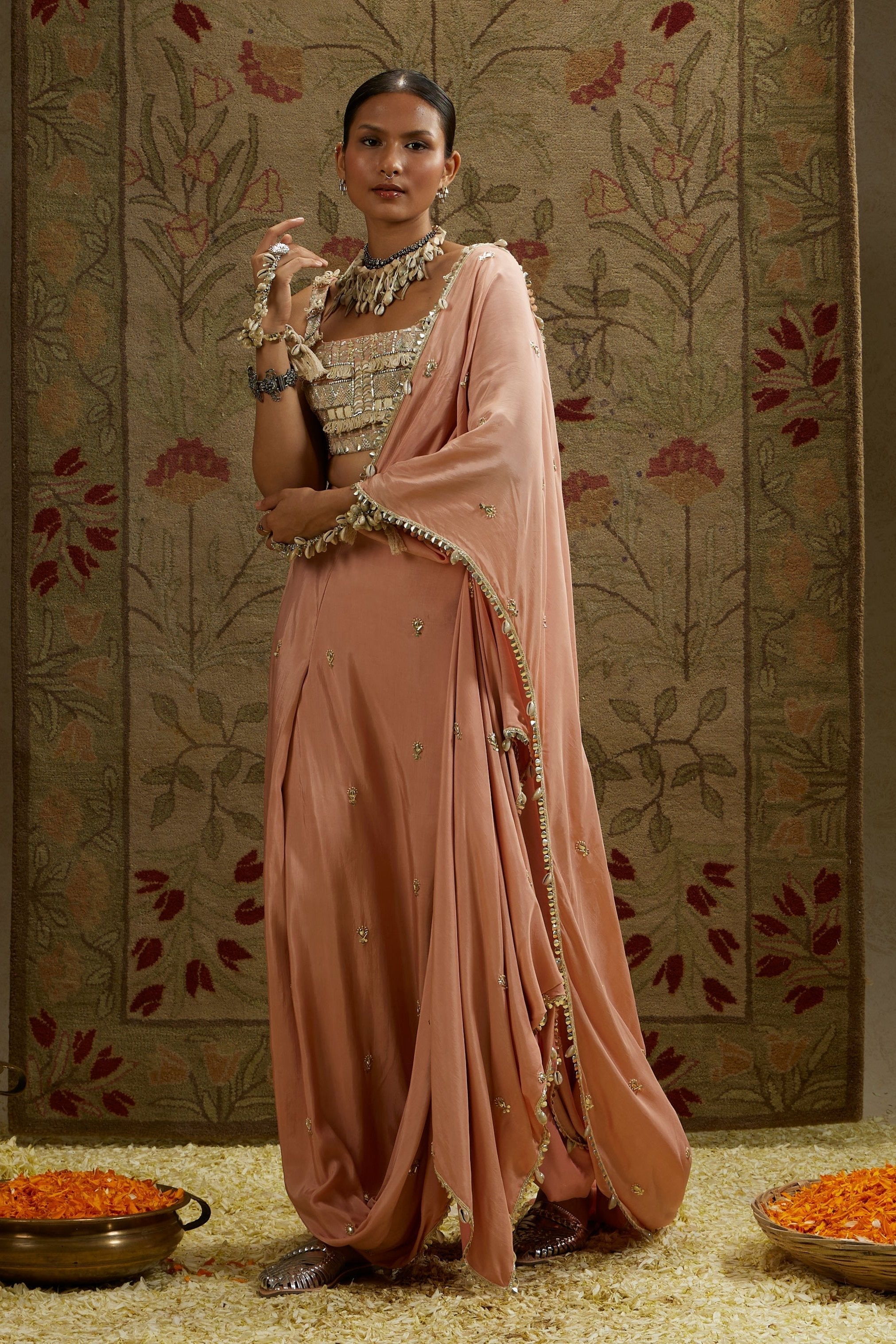 PINK EMBELLISHED SAREE PAIRED WITH EMBELLISHED BUSTIER AND DRAPED SKIRT