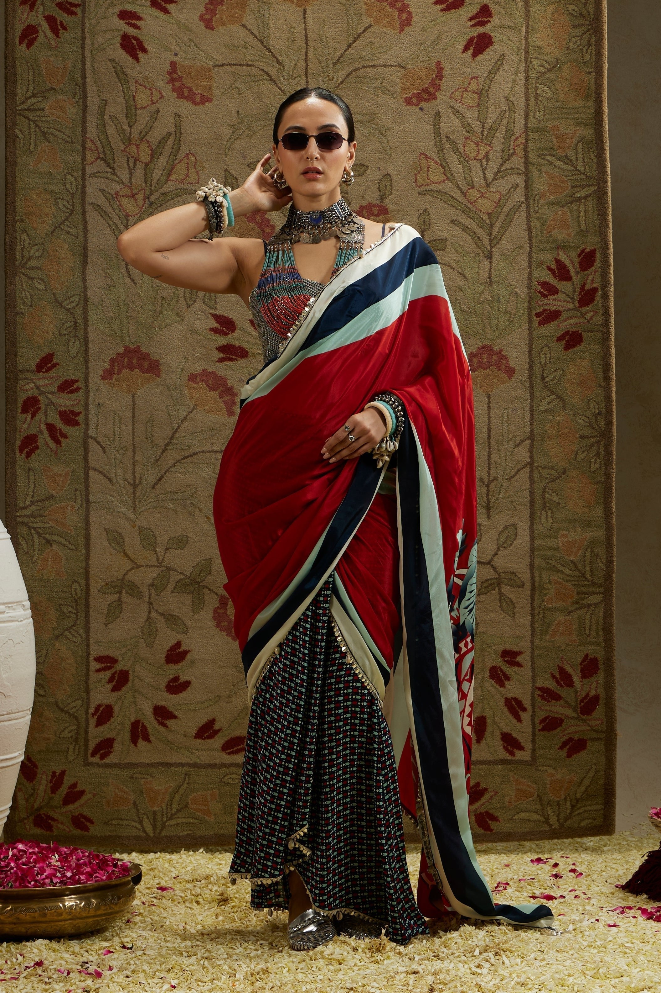 RED MASK PRINT CASCADE SAREE WITH METAL EMBELLISHED BUSTIER