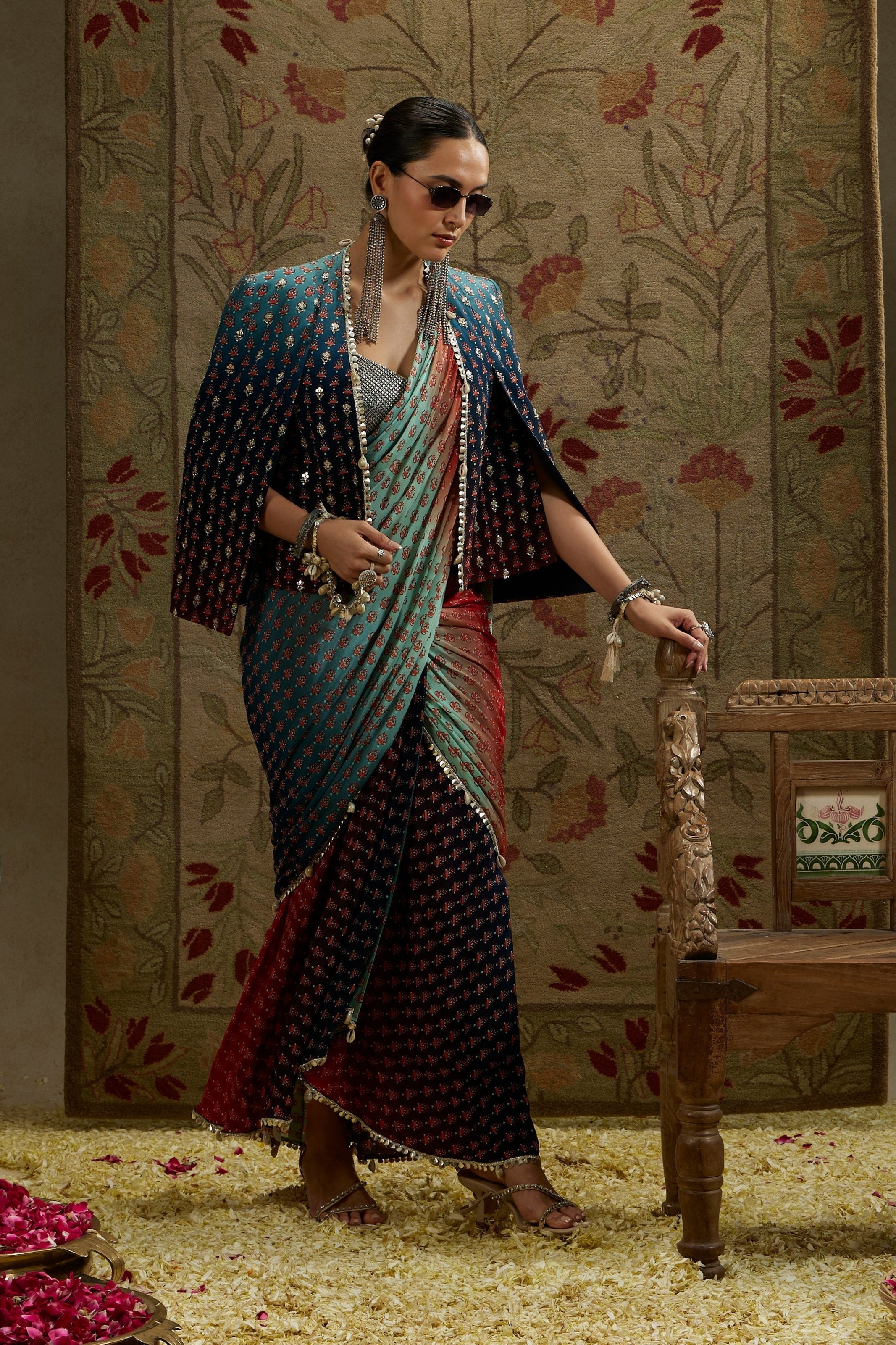 Red & Blue Ombre Print Cascade Saree With Metal Embellished Bustier Paired With Blue Ombre Embellished Cape Jacket
