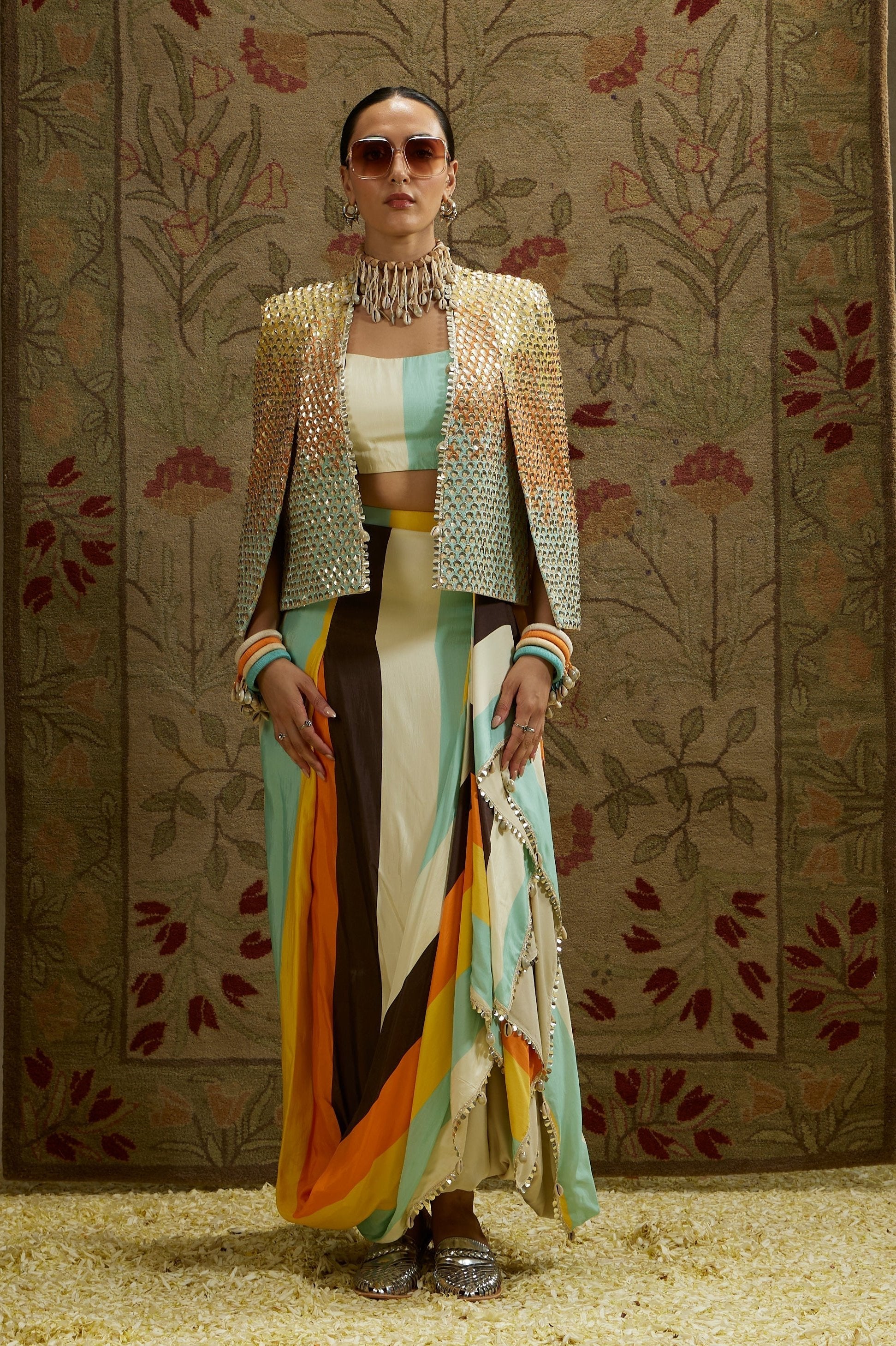 MULTI COLORED METALLIC NOOR JACKET PAIRED WITH STRIPE PRINTED BUSTIER AND SKIRT