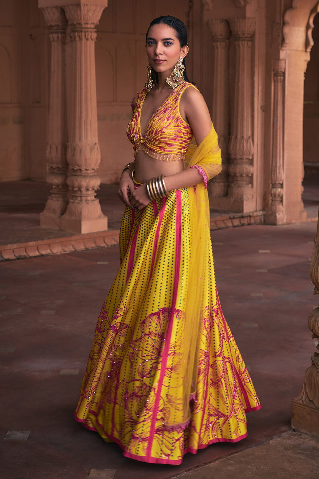 Yellow top and green lehenga with flower detailing main image 1