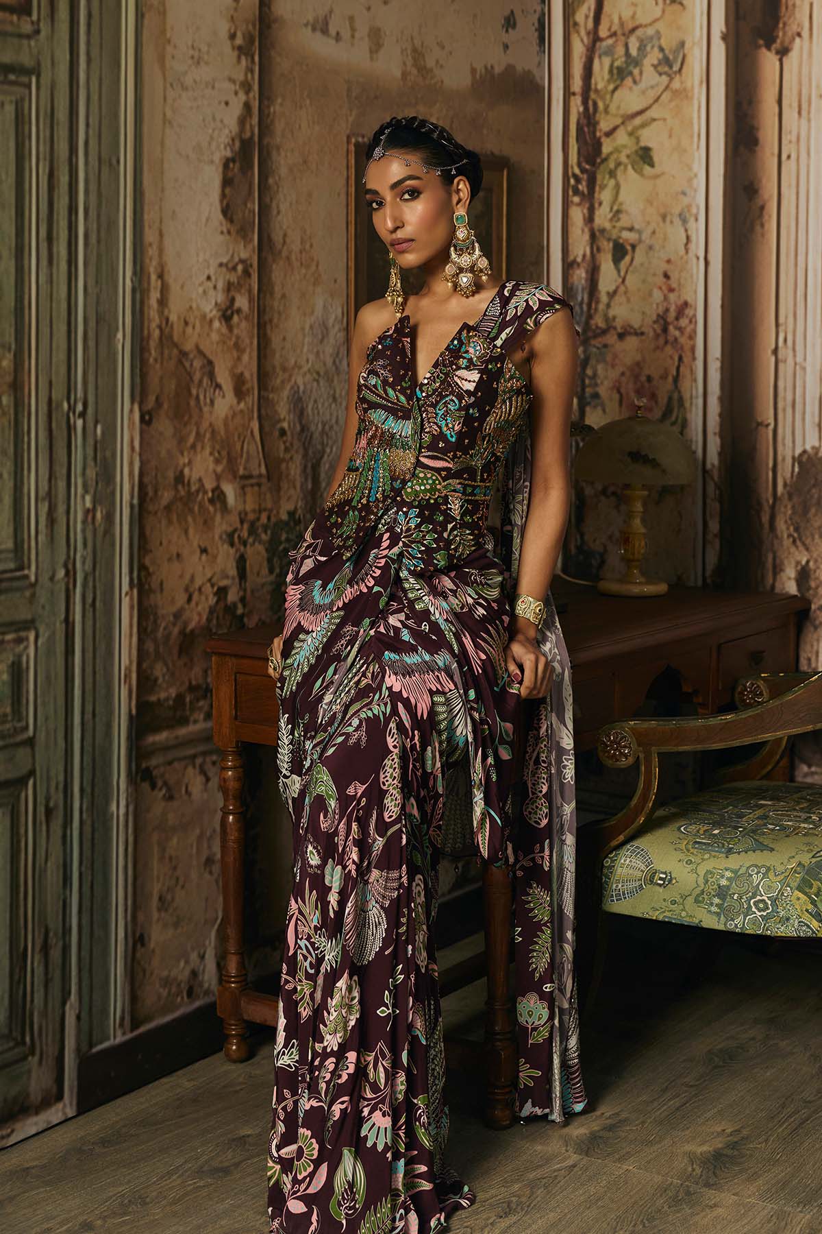 PLUM PRINTED AND HIGHLIGHTED CORSET WITH DHOTI SKIRT SAREE SET