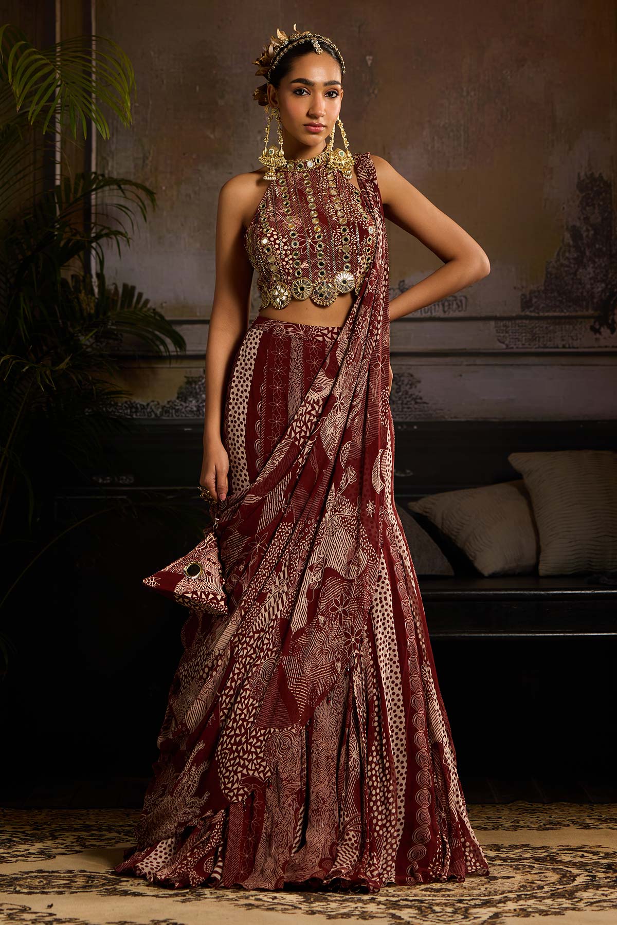 Nora Fatehi in Maroon Print and Highlighted Mermaid Saree Set