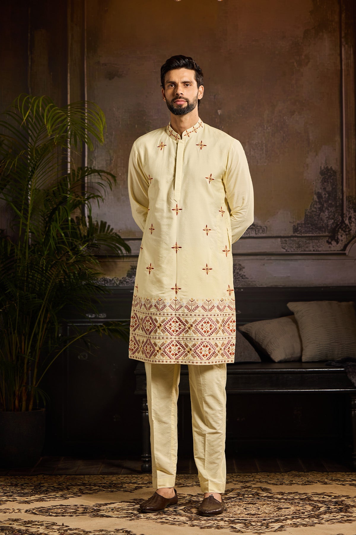 PASTEL YELLOW TRIBLE EMBROIDERED KURTA PAIRED WITH PASTEL YELLOW PANTS