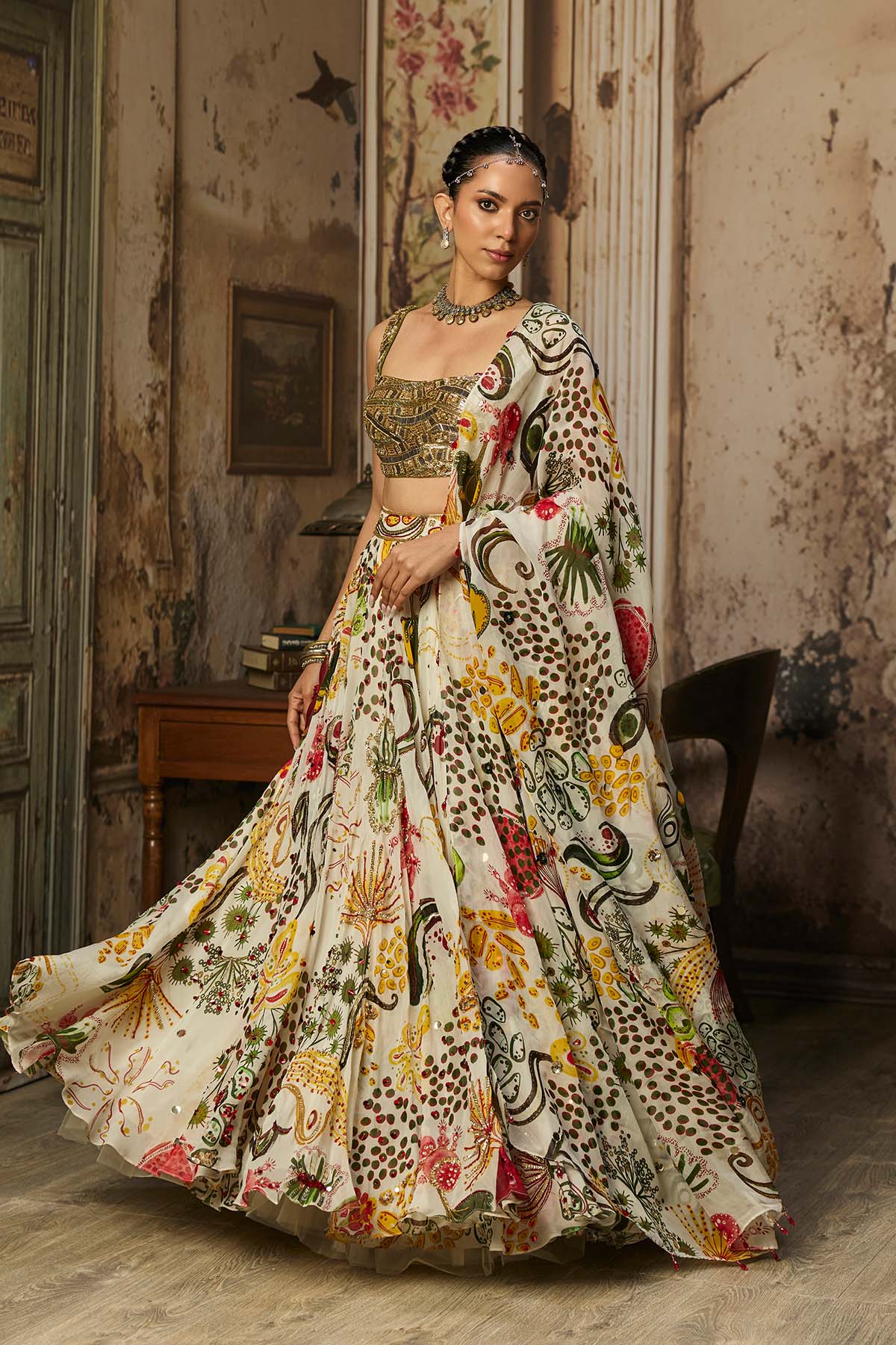 LIGHT GOLD EMBELLISHED BLOUSE AND HIGHLIGHTED LEHENGA SET