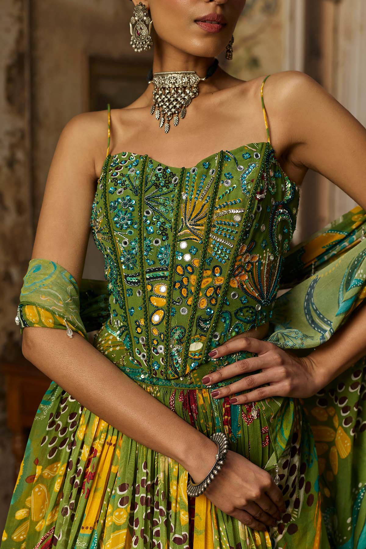 PEAR GREEN PRINTED AND HIGHLIGHTED CORSET LEHENGA SET