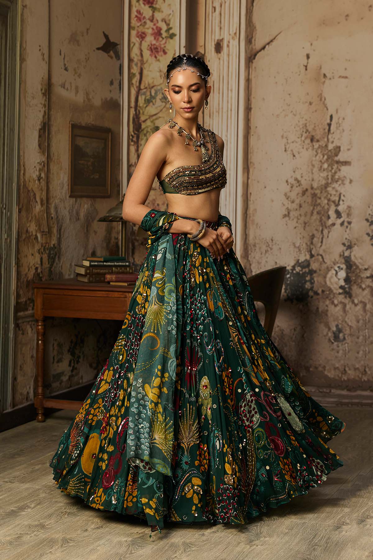 DARK GREEN EMBELLISHED BOUSE WITH PRINTED AND HIGHLIGHTED LEHENGA SET