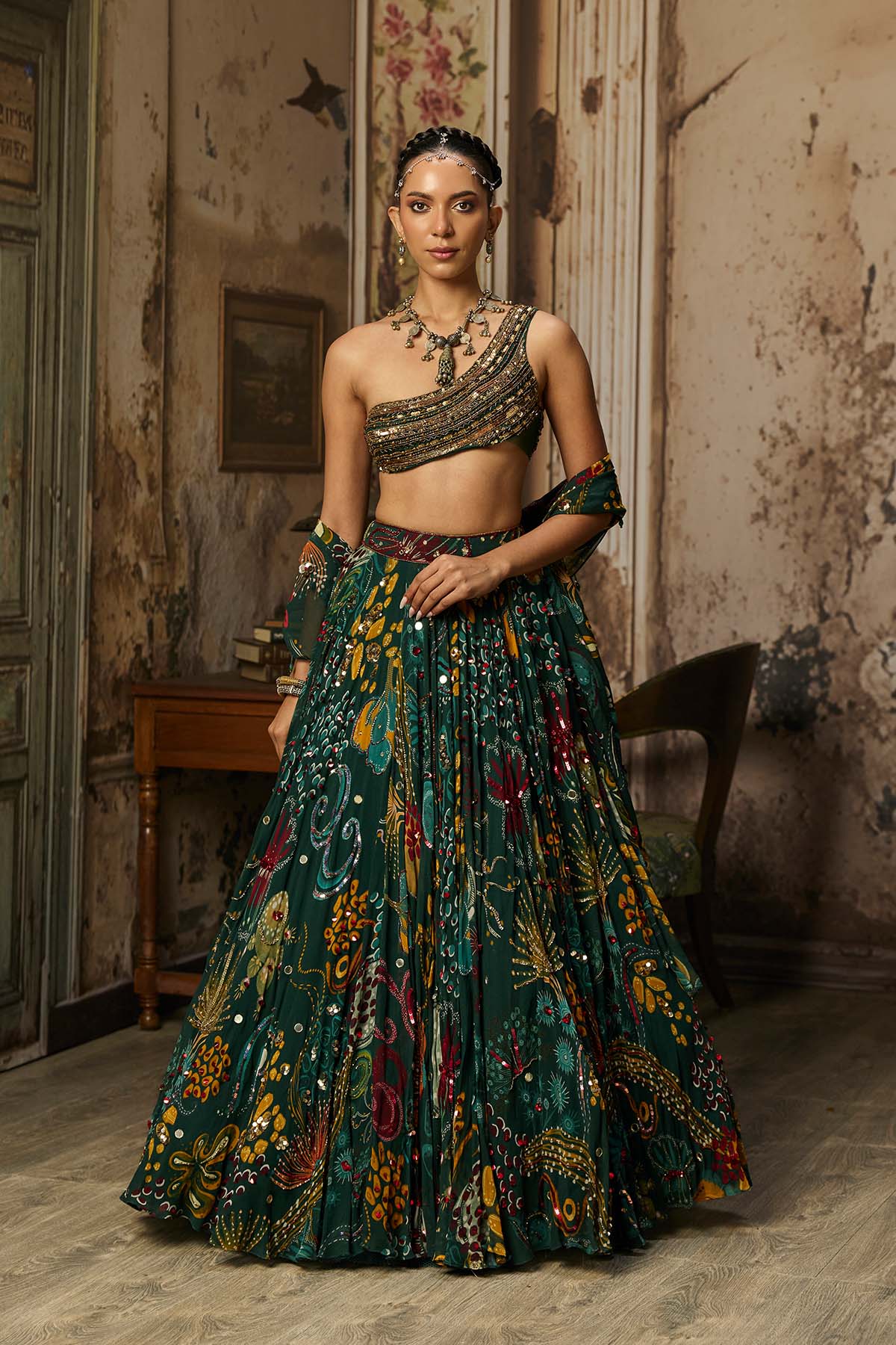 DARK GREEN EMBELLISHED BOUSE WITH PRINTED AND HIGHLIGHTED LEHENGA SET