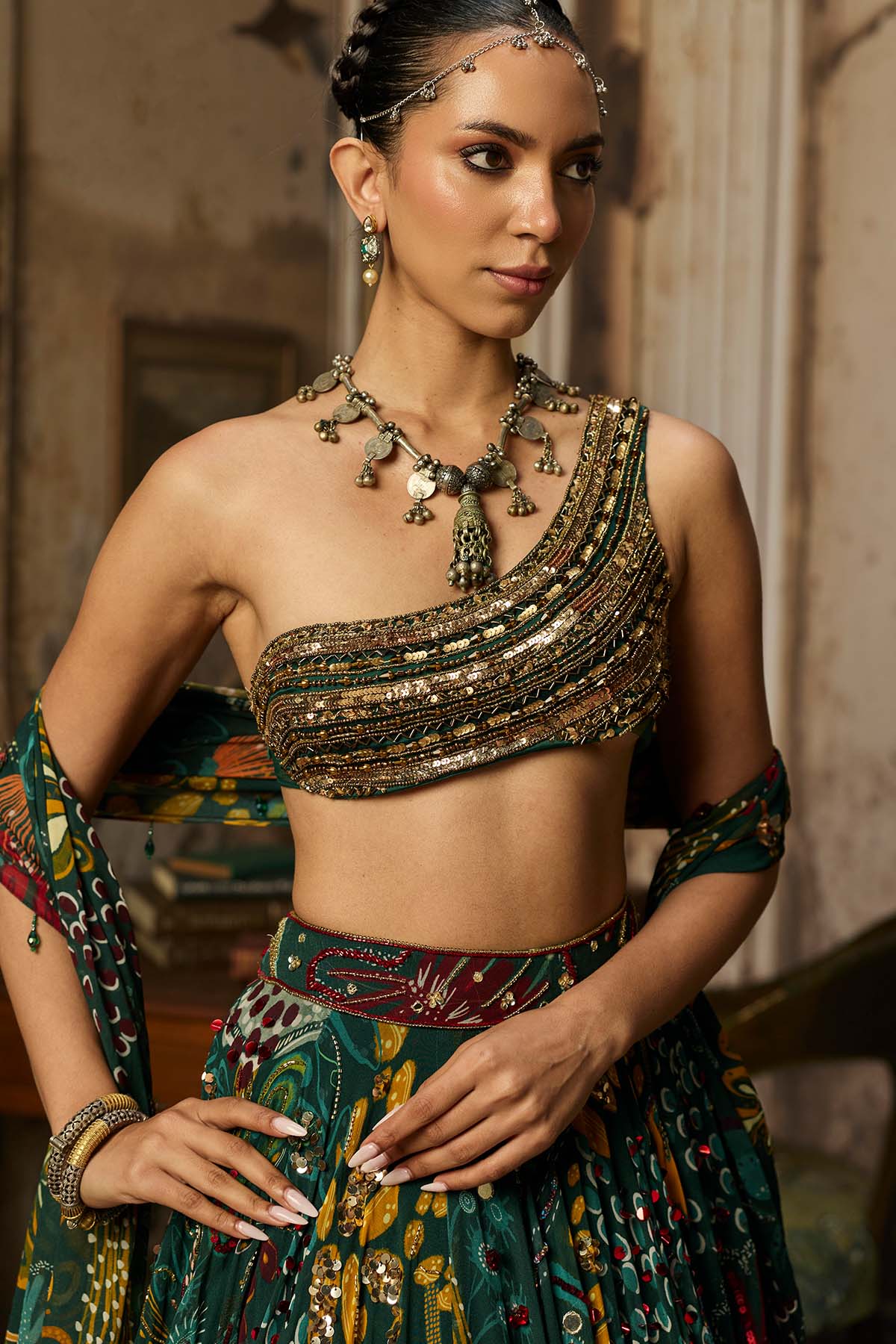 DARK GREEN EMBELLISHED BOUSE WITH PRINTED AND HIGHLIGHTED LEHENGA SET