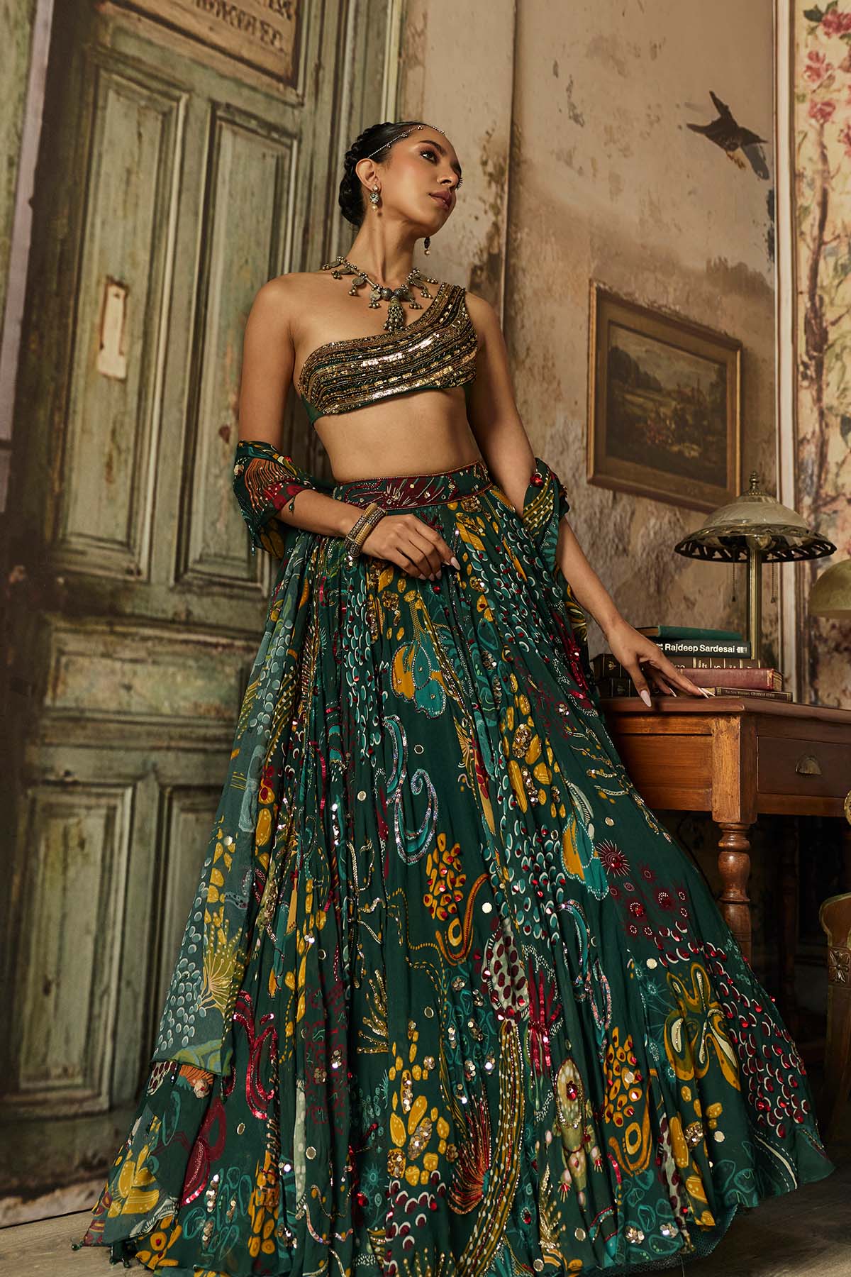 DARK GREEN EMBELLISHED BOUSE WITH PRINTED AND HIGHLIGHTED LEHENGA SET