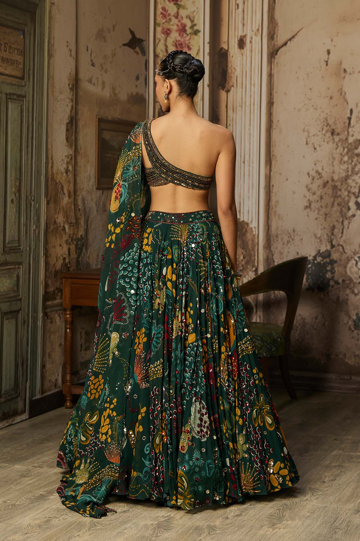 DARK GREEN EMBELLISHED BOUSE WITH PRINTED AND HIGHLIGHTED LEHENGA SET