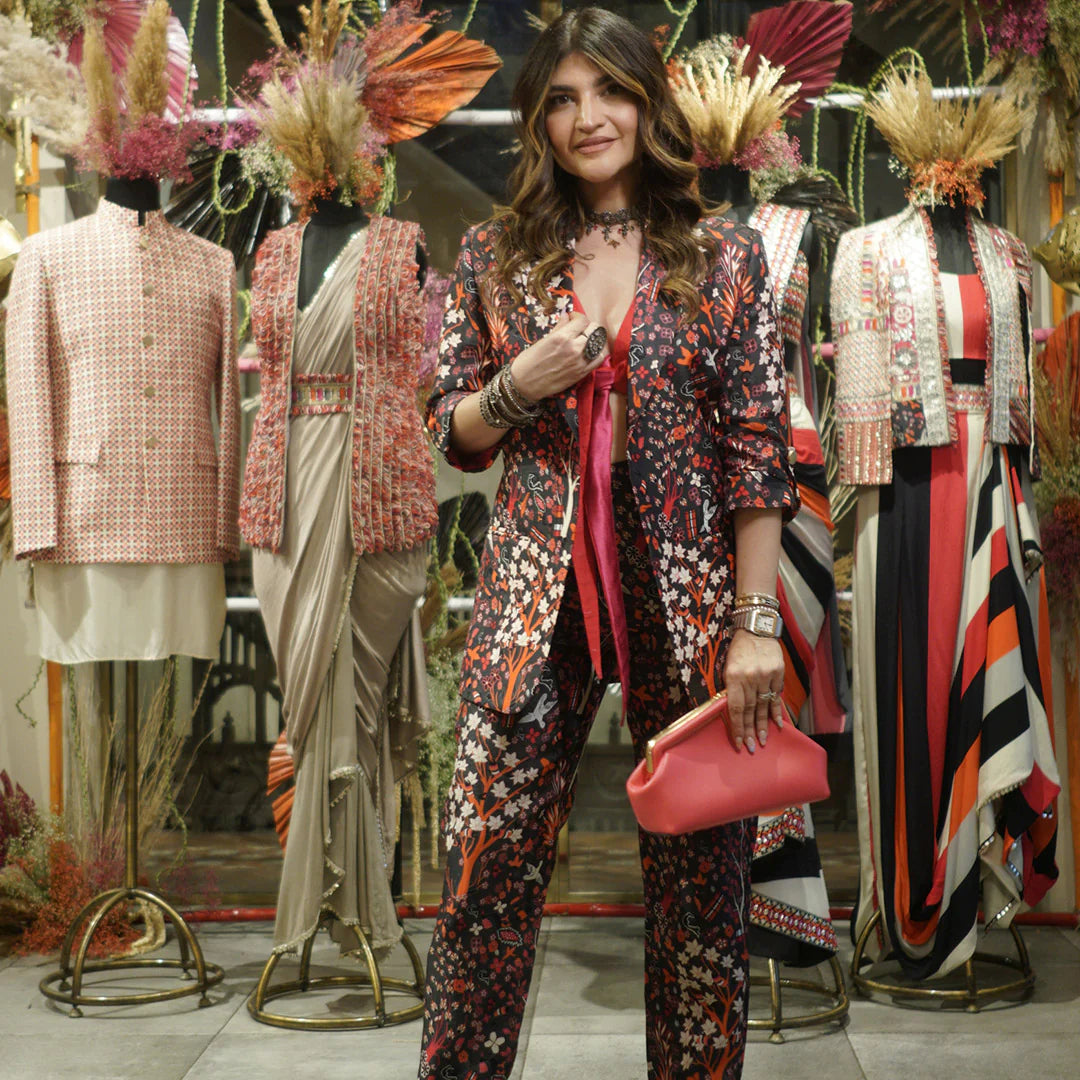 CONCRETE JUNGLE PRINT PANT SUIT TEAMED WITH A GRAPHIC COLOR BLOCK KOLI BLOUSE