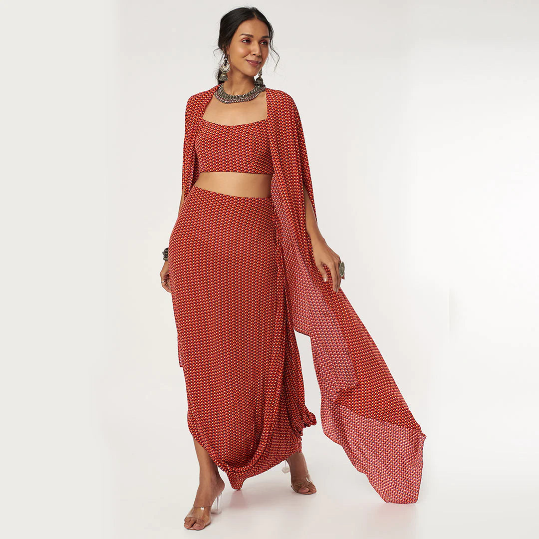 RED LEAF PRINT DRAPE SKIRT WITH ARYA BUSTIER AND CAPE
