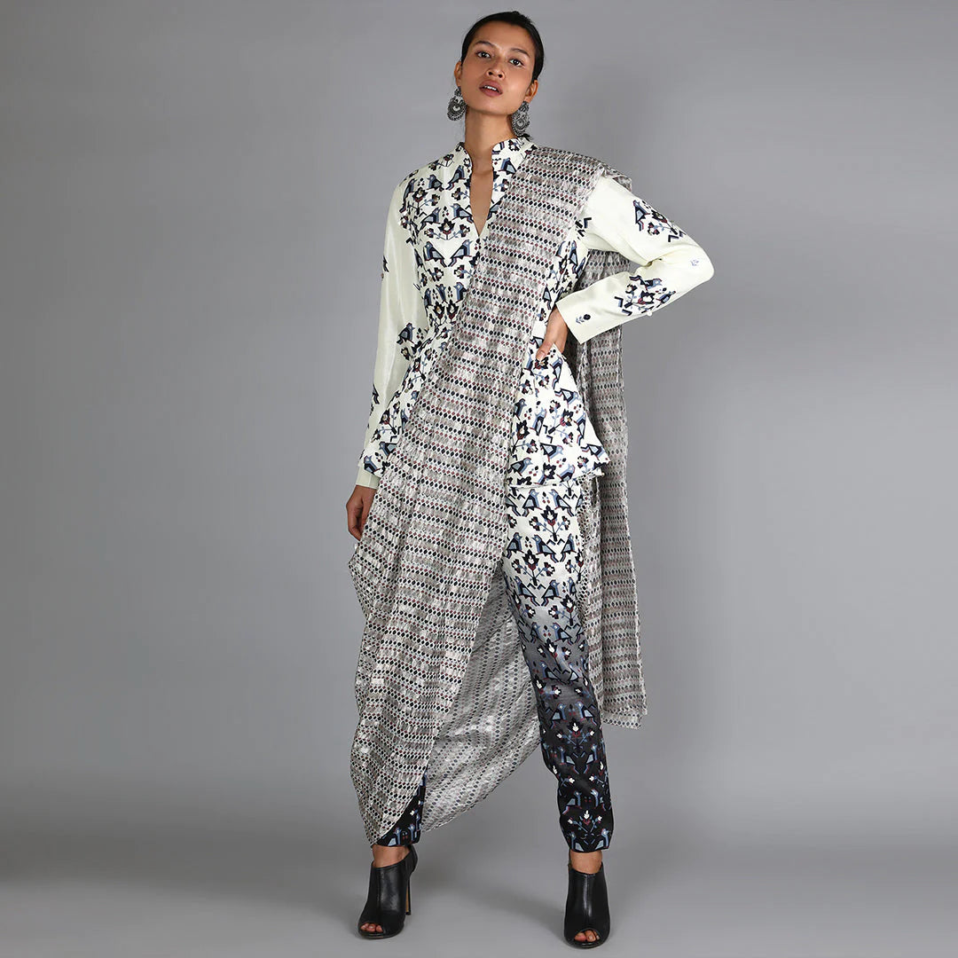 BLACK AND WHITE OMBRE PANTS WITH ATTACHED DRAPE PAIRED WITH WHITE PRINTED PEPLUM TOP