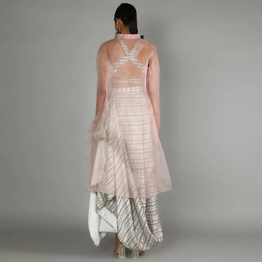 WHITE JAALI PRINT CHANDERI DRAPE SKIRT WITH PRINTED BUSTIER PAIRED WITH BLUSH PINK ORGANZA JACKET