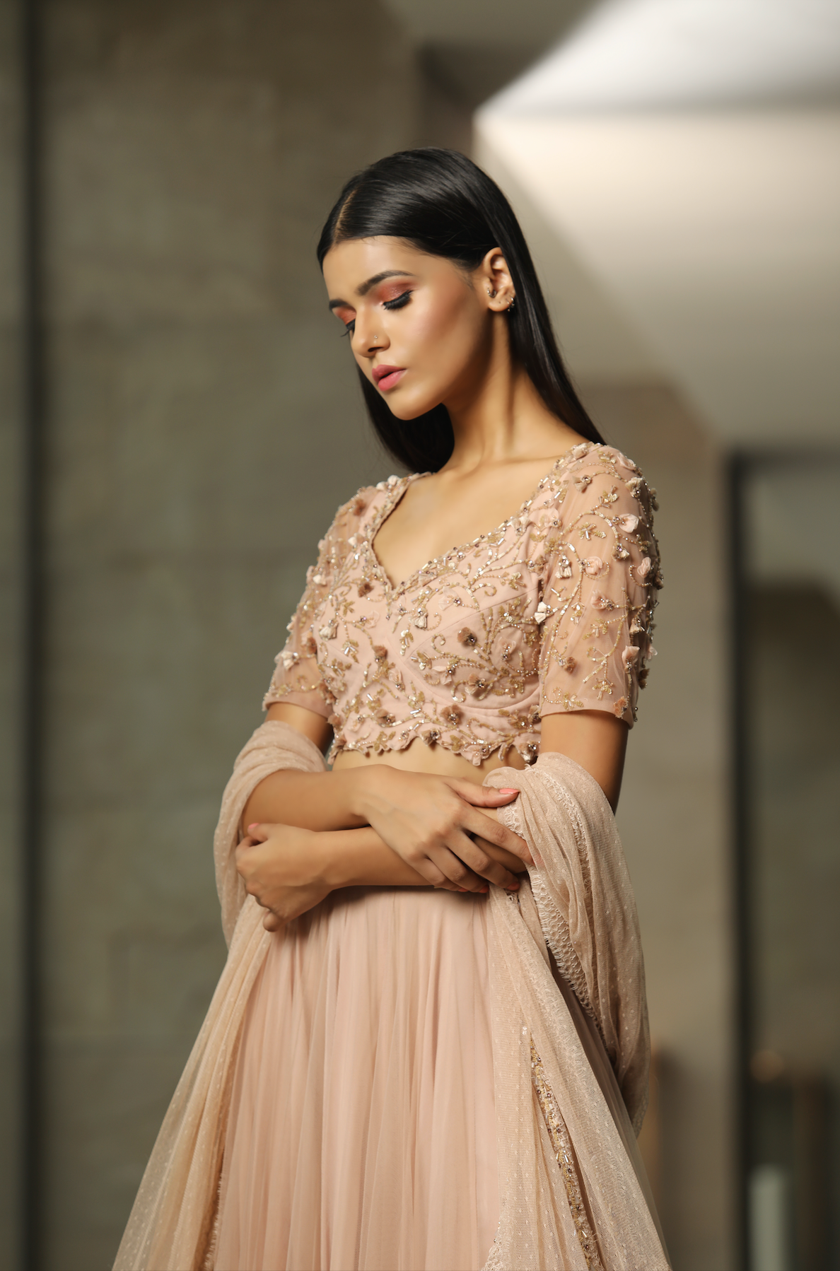 Katrina Kaif in Nude Sheer Back Blouse Lehenga Set