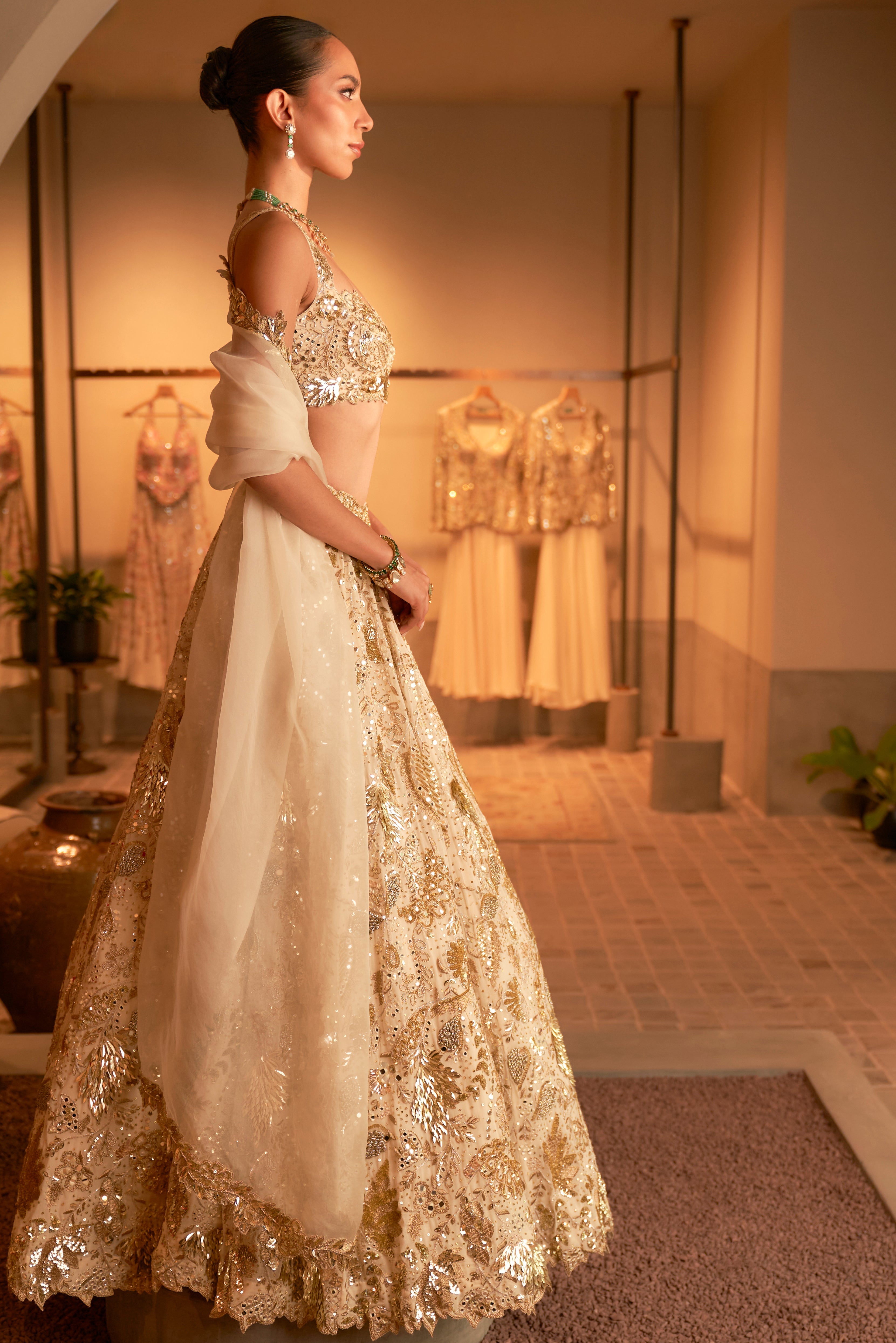 Ivory And Gold Heavily Embroidered Lehenga Set