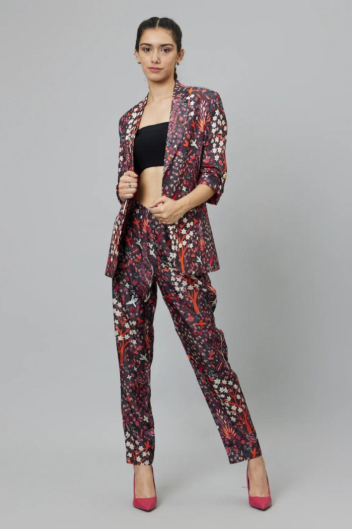 CONCRETE JUNGLE PRINT PANT SUIT PAIRED WITH A BUSTIER