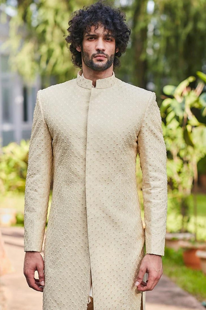 BEIGE SHERWANI WITH SELF FLOWER BUTTI AND PANTS