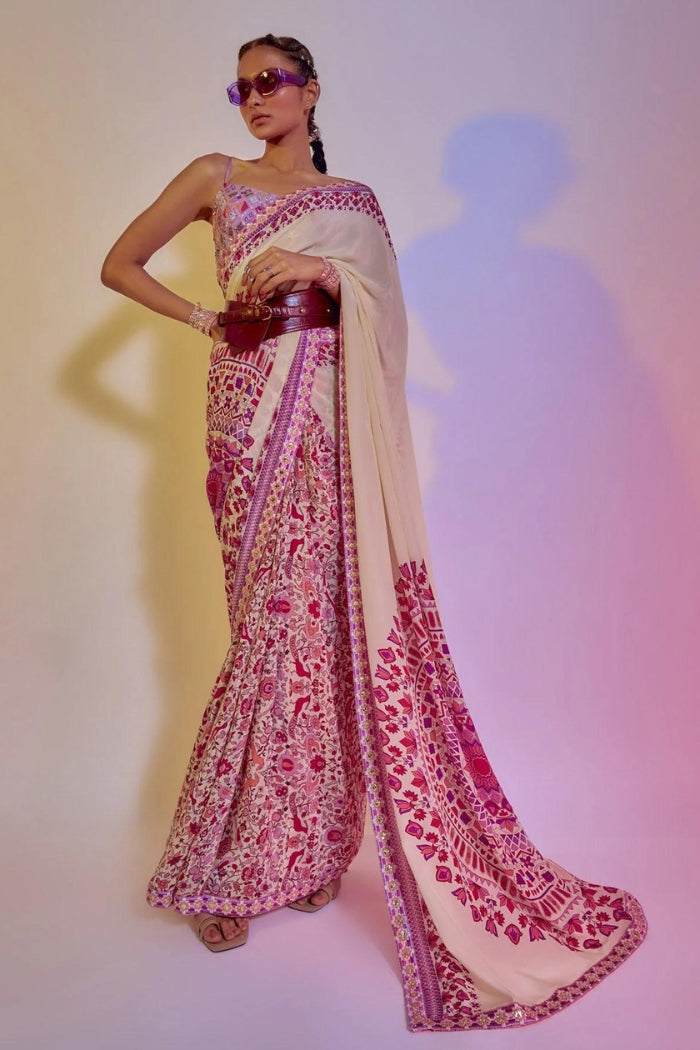 RAVI PRINT PALLU WITH IVORY SAANJH FLORAL PRINT SAREE TEAMED WITH A LILAC EMBELLISHED BUSTIER