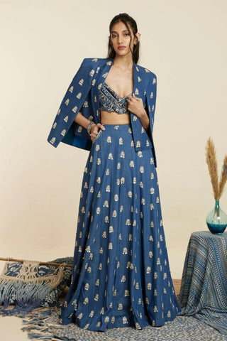 TEXTURED CROP TOP TEAMED WITH EMBELLISHED BLUE BUTTI PRINT BOX PLEAT PANTS HIGHLIGHTED CAPE