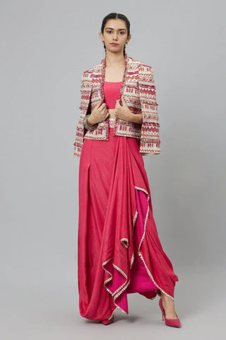 RED CROP TOP WITH ATTACHED DRAPE OF LEAF PRINT AND RED JAAL PRINT WITH BLUE SHARARA PANTS WITH EMB BELT