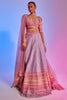 LILAC EMBELLISHED LEHENGA WITH A SUNSET HUES BORDER TEAMED WITH INTRICATE PATCH WORK BLOUSE AND LILAC ORAGNZA DUPATTA