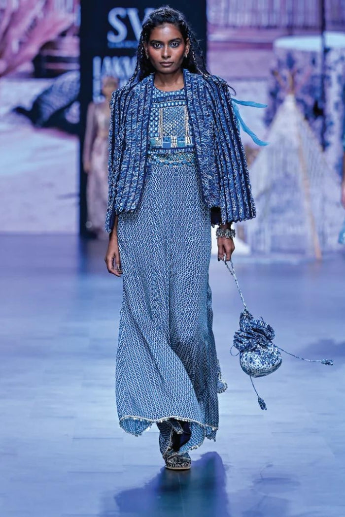 BLUE GEOMETRIC PRINT JUMPSUIT WITH BLUE TEXTURED NOOR JACKET