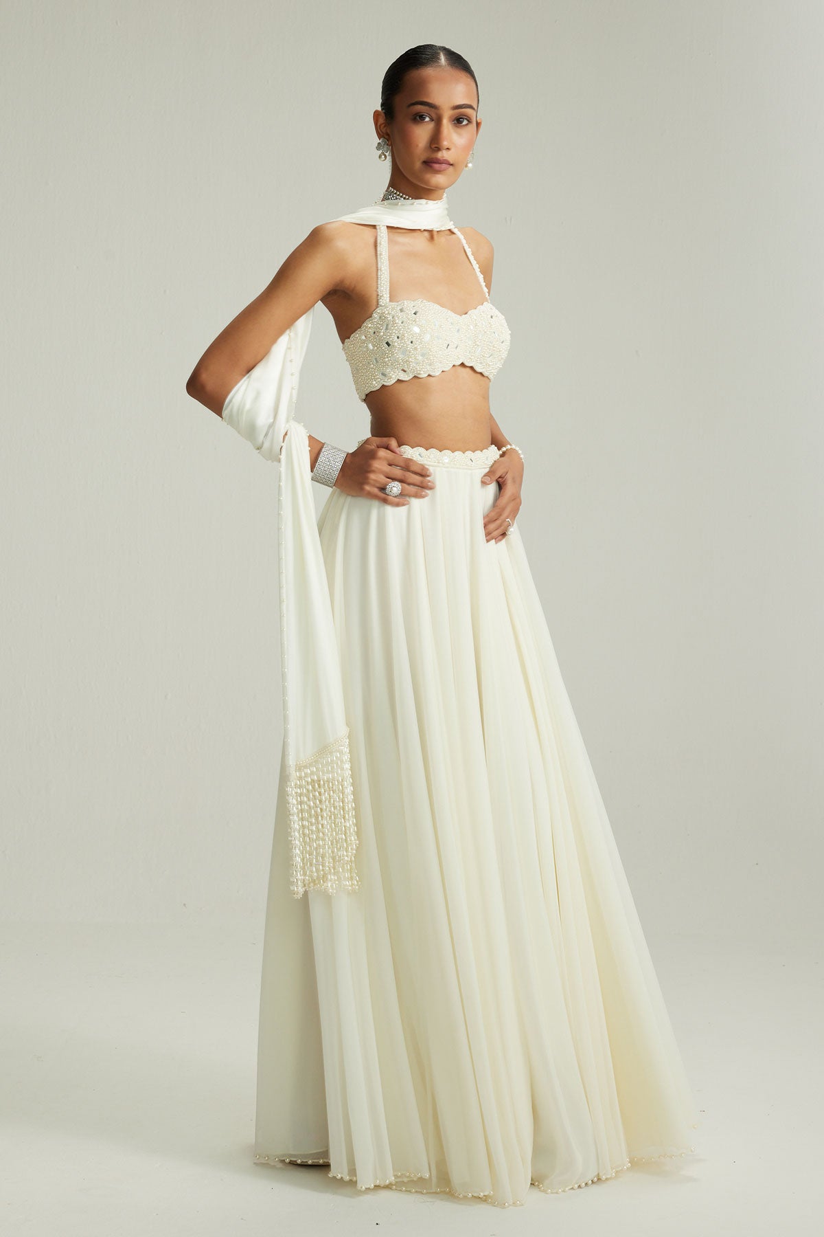 Off White Skirt Set With Halter Neck Blouse