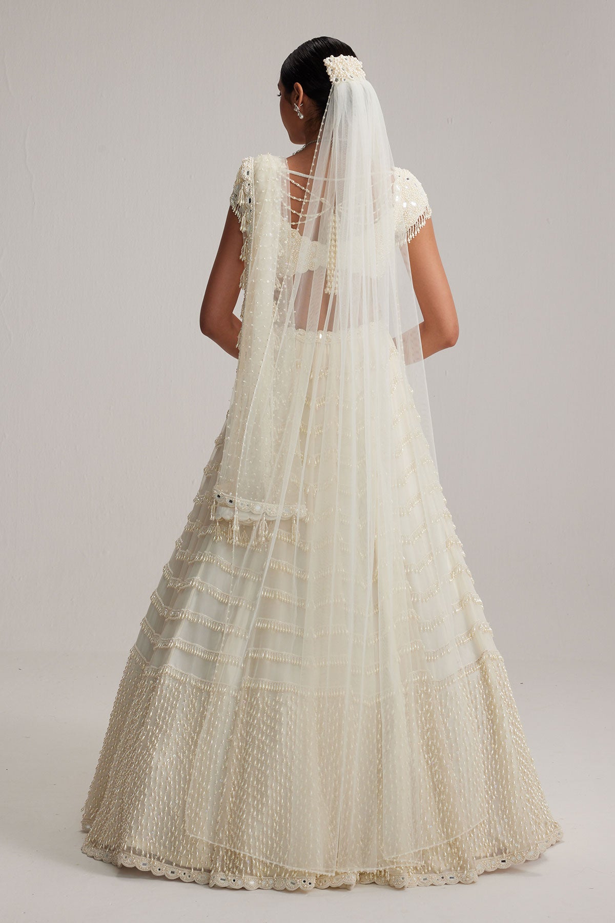 Off White Mirror and Pearl Drop Bridal lehenga set with Veil