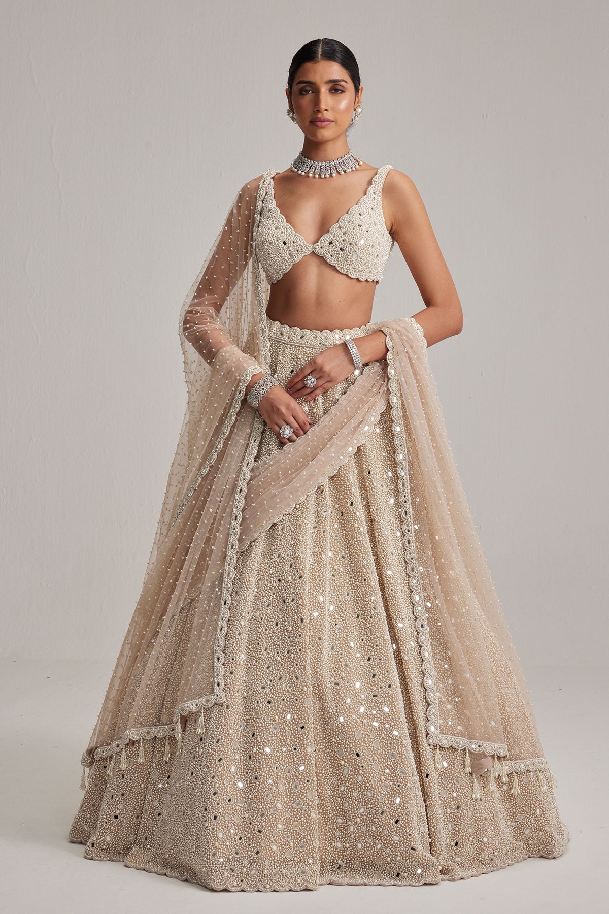 Light Beige Dense mirror and pearl lehenga set with Double Dupatta and Veil