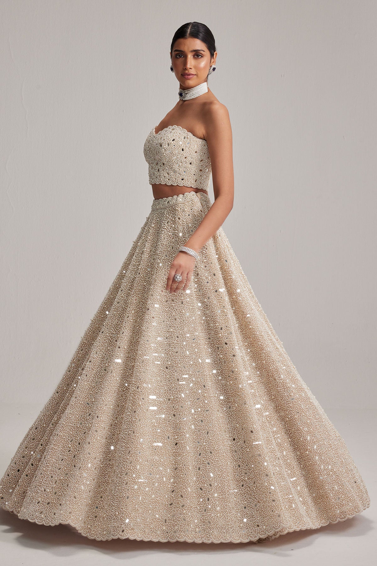Light Beige Dense mirror and pearl Corset lehenga set