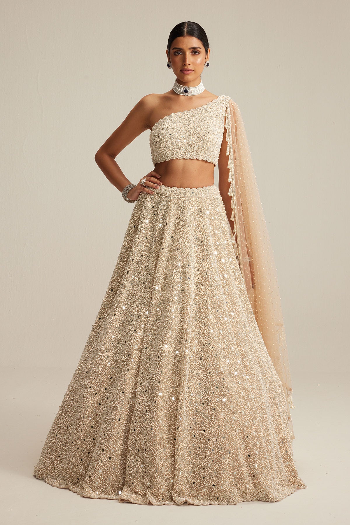 Light Beige Dense mirror and pearl one shoulder lehenga set