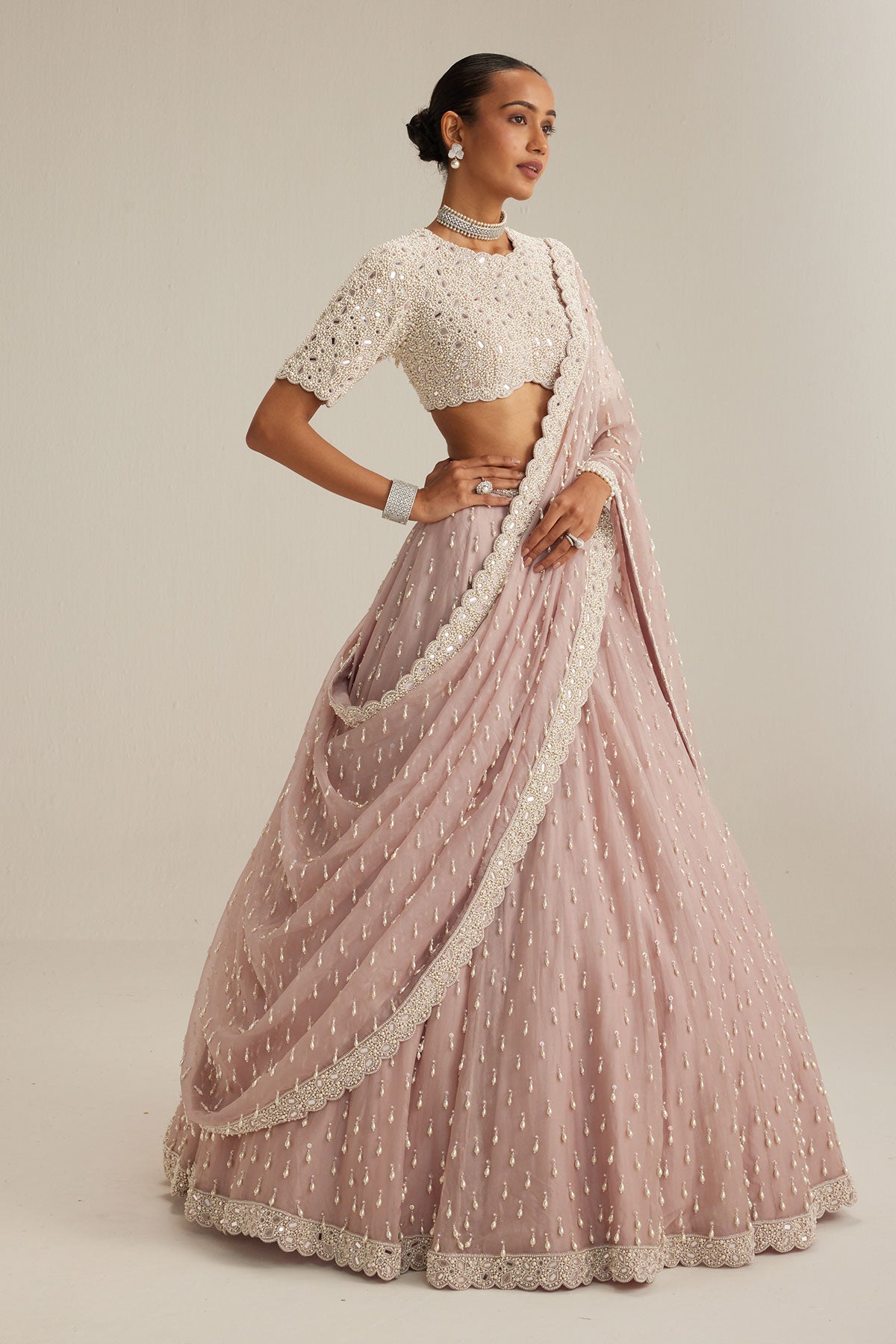 Ash Pink Pearl Drop Lehenga with high neck blouse
