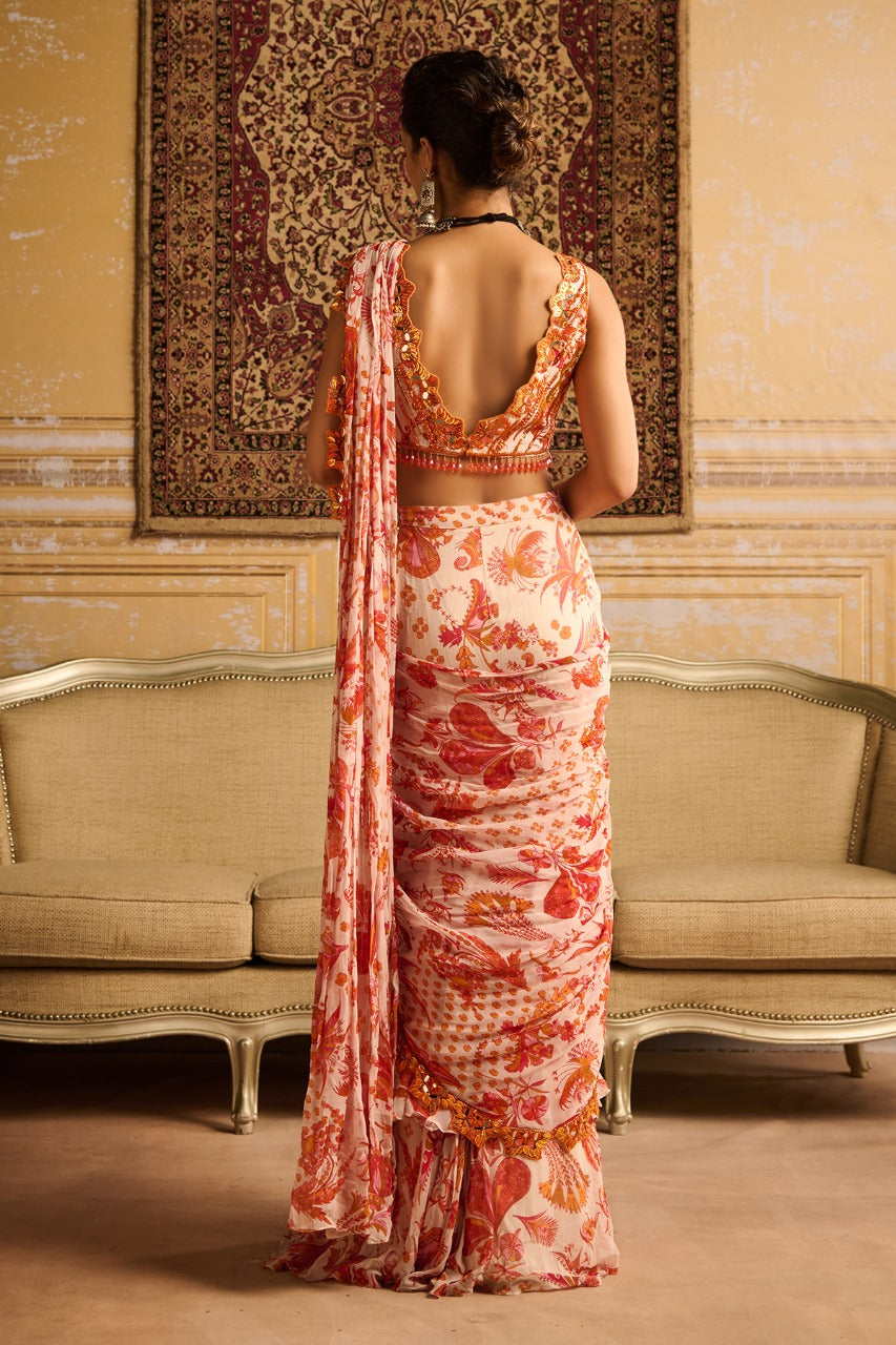 Orange print & embroidered blouse and skirt saree set
