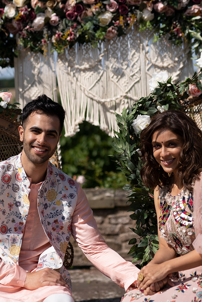 TAISH COLLECTION - CREAM COLOUR PRINTED DUPION SILK BANDI WITH ROSE PINK SILK KURTA AND OFF WHITE COTTON SILK CHURIDAR