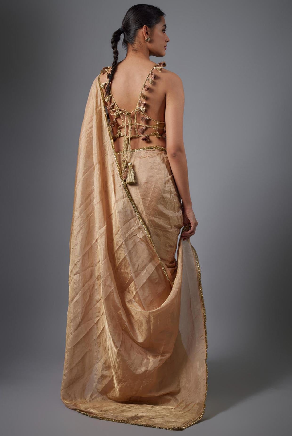 Dull Rose Color Embroidered Tissue Fabric Short Choli With Stitched Saree