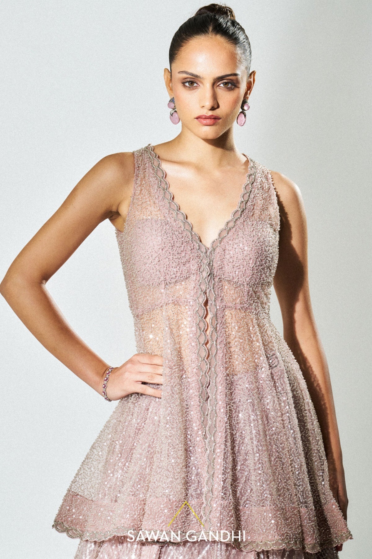 Dusky pink peplum sequins lehenga