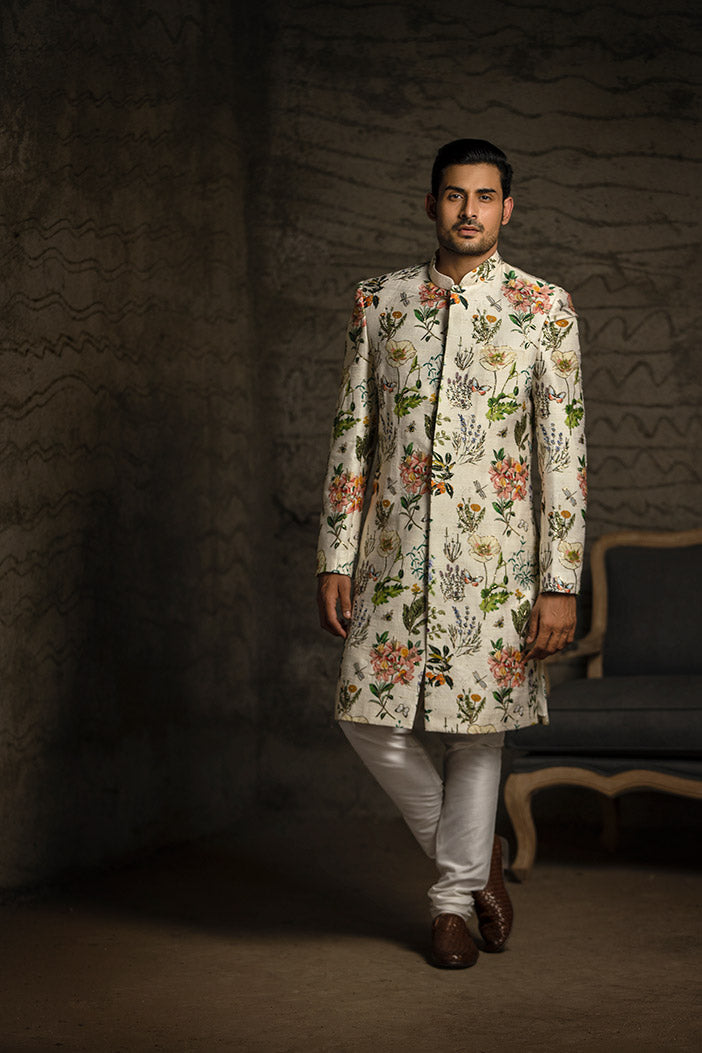 IVORY PRINTED DUPION SILK SHERWANI WITH OFF WHITE COTTON SILK CHURIDAR