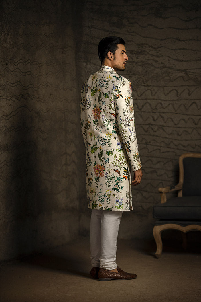 IVORY PRINTED DUPION SILK SHERWANI WITH OFF WHITE COTTON SILK CHURIDAR