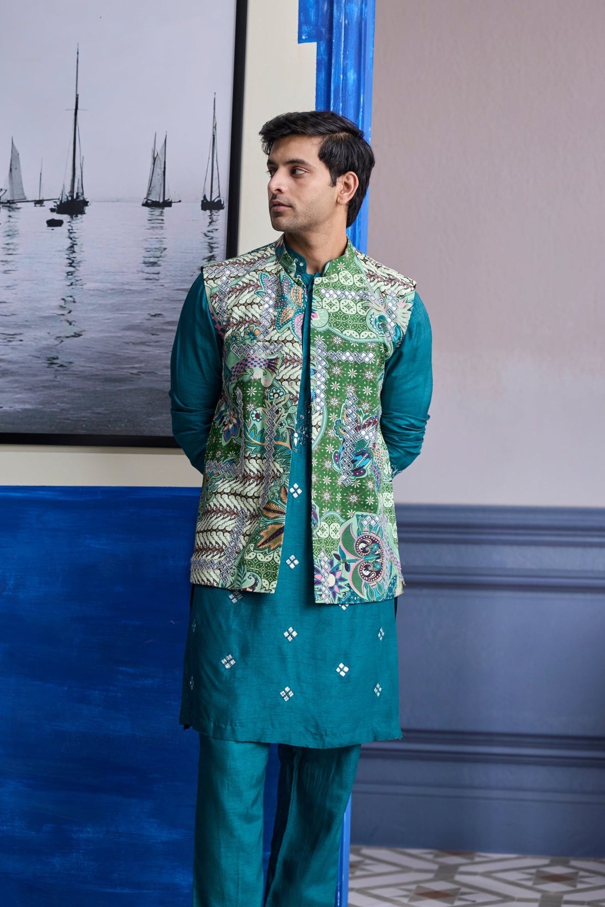 Teal Green Embroidered Kurta With Print Highlighted Bundi Jacket Paierd With Solid Pants