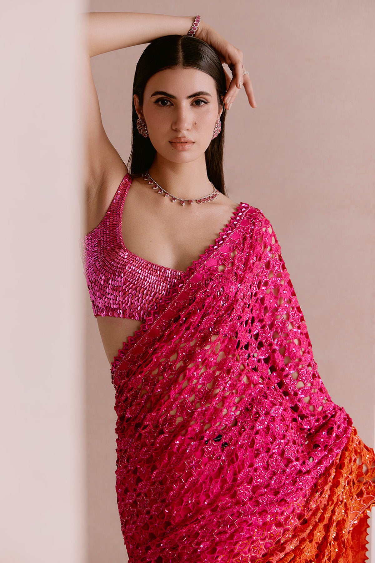 pink to orange cutwork saree set
