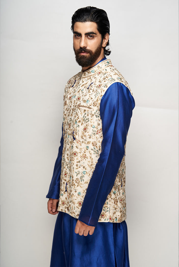 PS MEN RAZA CREAM COLOUR GEORGETTE EMBROIDERED BANDI WITH COBALT BLUE COLOUR KURTA AND CHURIDAR