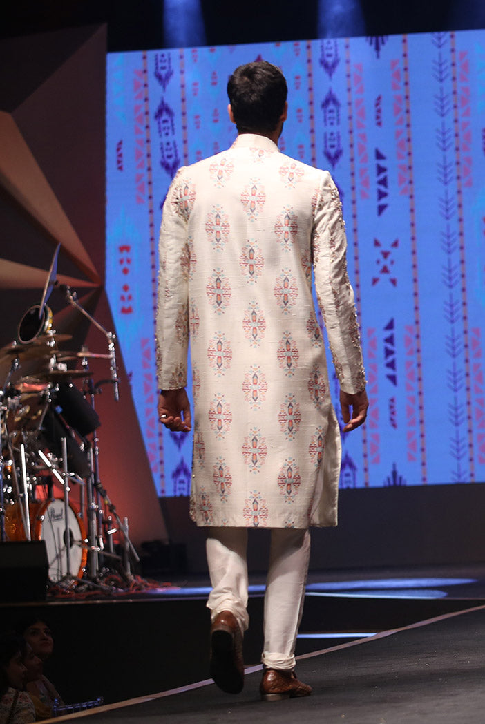 REYHAN CREAM PRINTED DUPION SILK SHERWANI WITH OFF WHITE COTTON SILK CHURIDAR